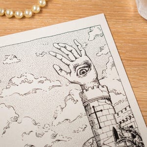 May include: Black and white illustration of a hand with an eye in the palm, emerging from a castle tower. The artwork is set against a cloudy sky background. A pearl necklace and crystals are in the background.