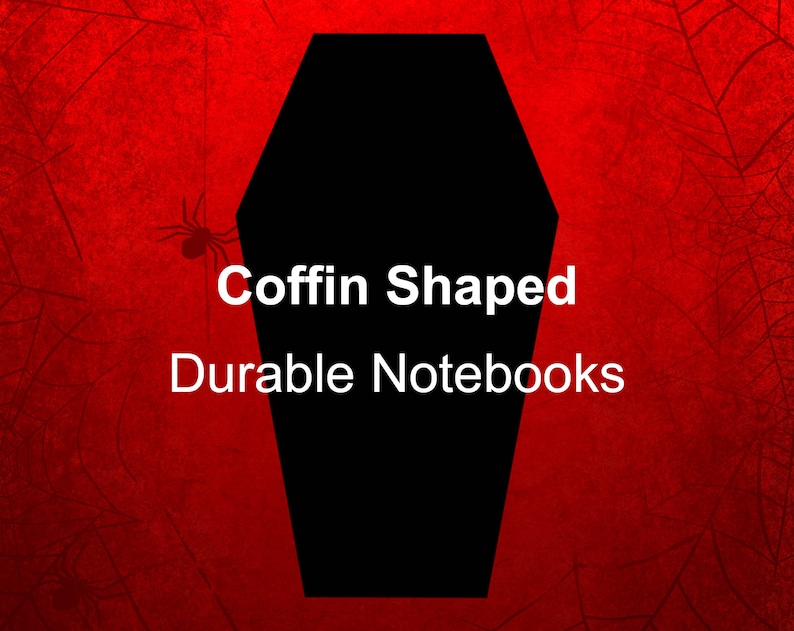 Może przedstawiać: Notesy w kształcie trumny z tekstem "Coffin Shaped Durable Notebooks" na czerwonym tle z czarnym wzorem pajęczyny.