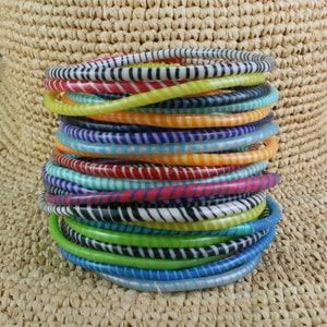 Assorted colors (#2) Set of 12 recycled flip flop bangle bracelets Lots more colors available. Handmade with women power! Bangles Bracelet.