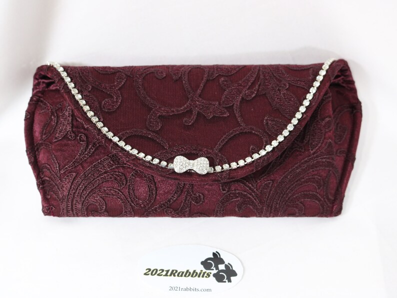 wine colored clutch