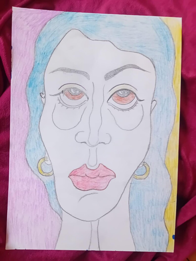 May include: A pencil drawing of a face with blue hair, red eyes, and pink lips. The drawing has gold hoop earrings and is set against a pink and yellow background. The style is reminiscent of a portrait.