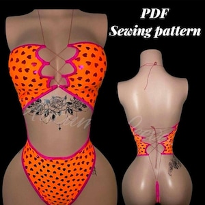 May include: An orange bodysuit with a heart pattern and pink trim. The garment has a lace-up front and back design. The text "PDF Sewing pattern" is visible in the image. The bodysuit is displayed on a mannequin.
