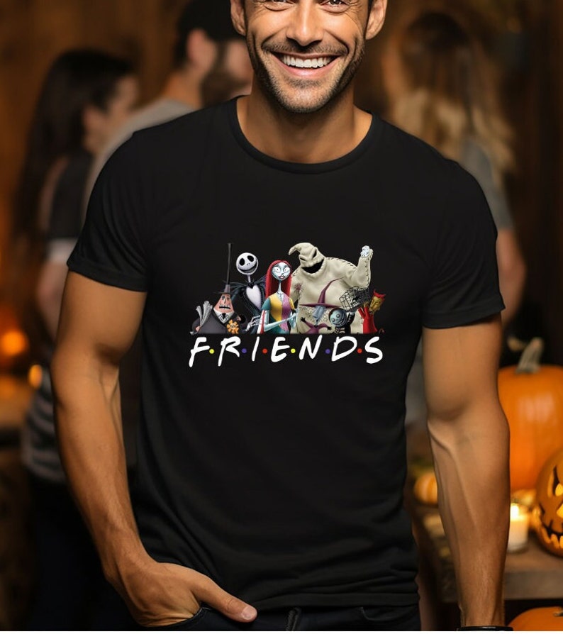 May include: Black t-shirt featuring a graphic of characters from the Nightmare Before Christmas film. The characters are arranged in a line with the text "FRIENDS" below them.