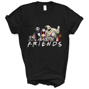 May include: Black t-shirt featuring a graphic of characters from the Nightmare Before Christmas film. The characters are arranged in a line with the text "FRIENDS" below them.
