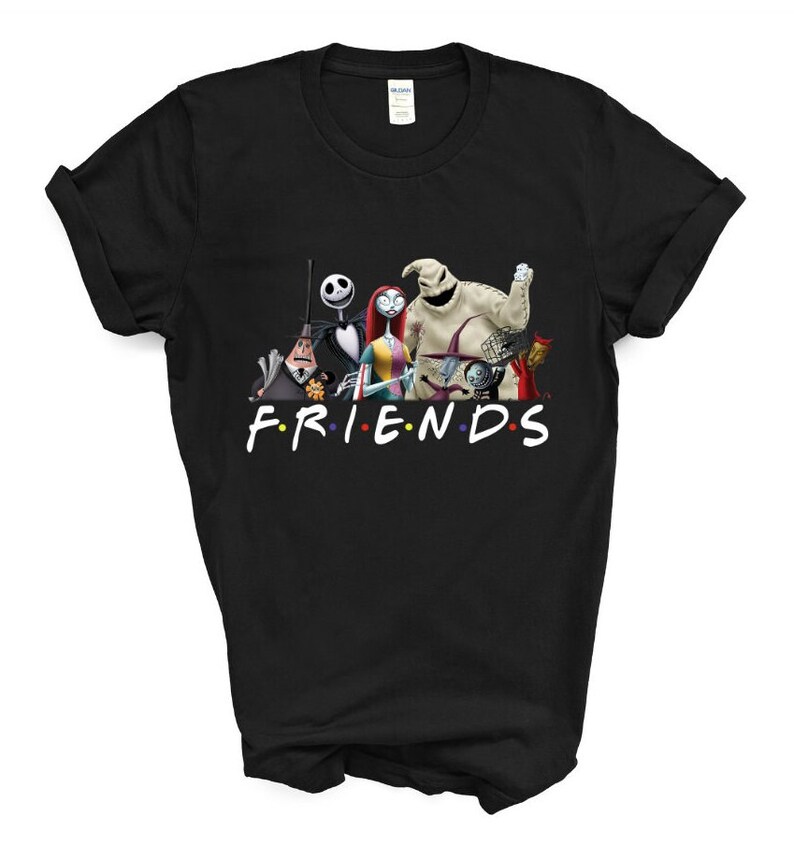 May include: Black t-shirt featuring a graphic of characters from the Nightmare Before Christmas film. The characters are arranged in a line with the text "FRIENDS" below them.