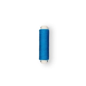 May include: A spool of bright blue thread.