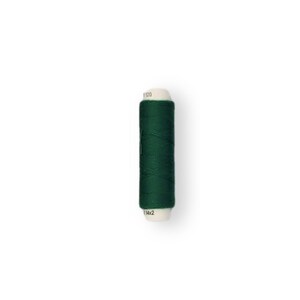 May include: A spool of dark green thread with white labels that read "1120" and "114x2".