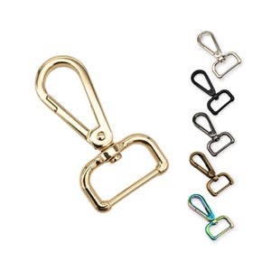 Op de afbeelding: Gouden, zilveren, zwarte, bronzen en iriserende metalen draaibare sluitingen. Elke sluiting heeft een haak en een rechthoekige lus.