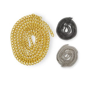 May include: Three chain links in gold, silver, and black metal. The chains are coiled into circles.