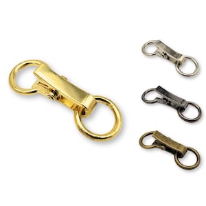 May include: Gold, silver, and bronze swivel snap hooks. These hooks are great for attaching to keychains, bags, or other items.
