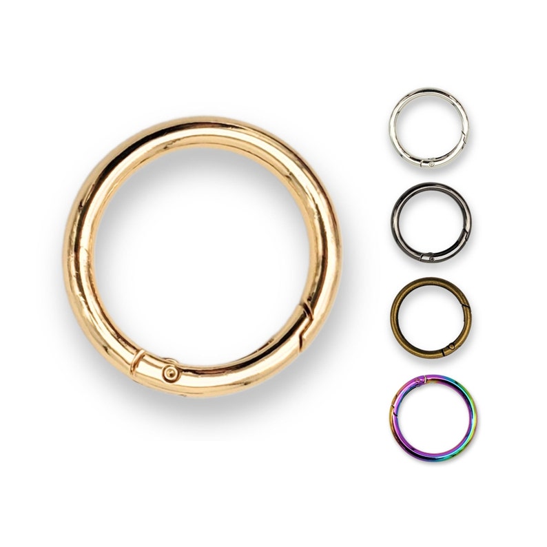 May include: Gold, silver, black, bronze, and rainbow colored metal key rings with a spring-loaded clasp.