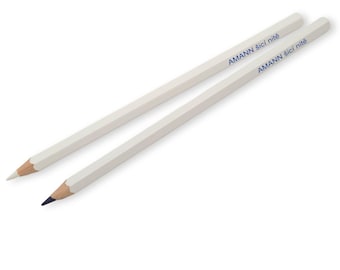 May include: Two white pencils with blue lettering that reads "AMANN Sic! nite"