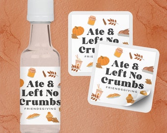 May include: A clear glass bottle with a white cap and labels that read "Ate & Left No Crumbs" with Thanksgiving-themed illustrations. Two matching square stickers are also visible, featuring the same text and graphics.