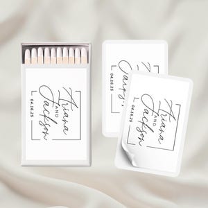 May include: White matchbox with a white label that says "Triana and Jackson" with a date of 04.16.25. Two white labels with the same text and date are shown next to the matchbox.