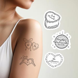May include: Black and white temporary tattoos with various designs. One tattoo features a heart with the letters "H" and "M" inside. Another says "Just Married" and "The Robinsons". Other designs include a disco ball and a heart with the text "the pattersons".