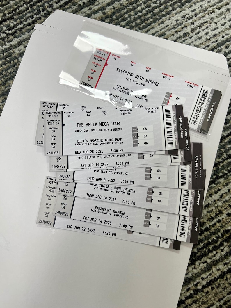 May include: A selection of concert tickets, including tickets for the Hella Mega Tour, Sleeping With Sirens, and other events. The tickets display event details such as dates, times, and venue names.