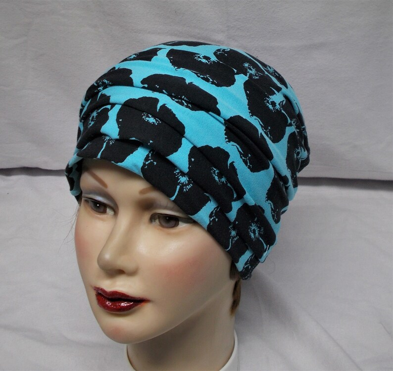 TURQUOISE and BLACK FLOWER Stretch Knit Skullcap Womens Beanie