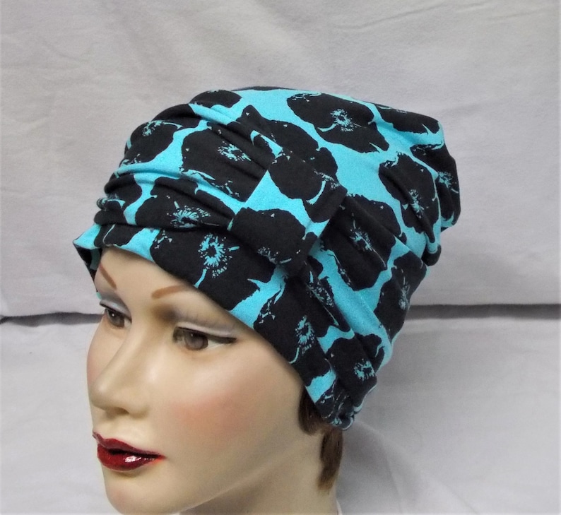 TURQUOISE and BLACK FLOWER Stretch Knit Skullcap Womens Beanie