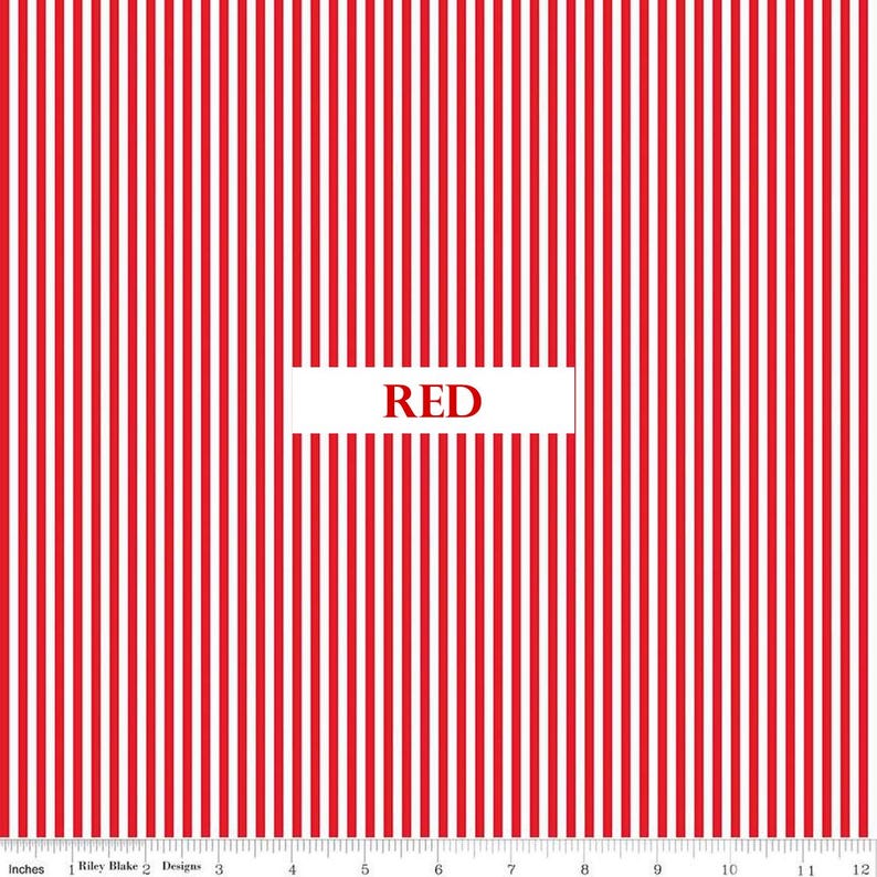 May include: Red and white striped fabric with the word "RED" in a white rectangle. The fabric is marked with inch measurements along the bottom edge.