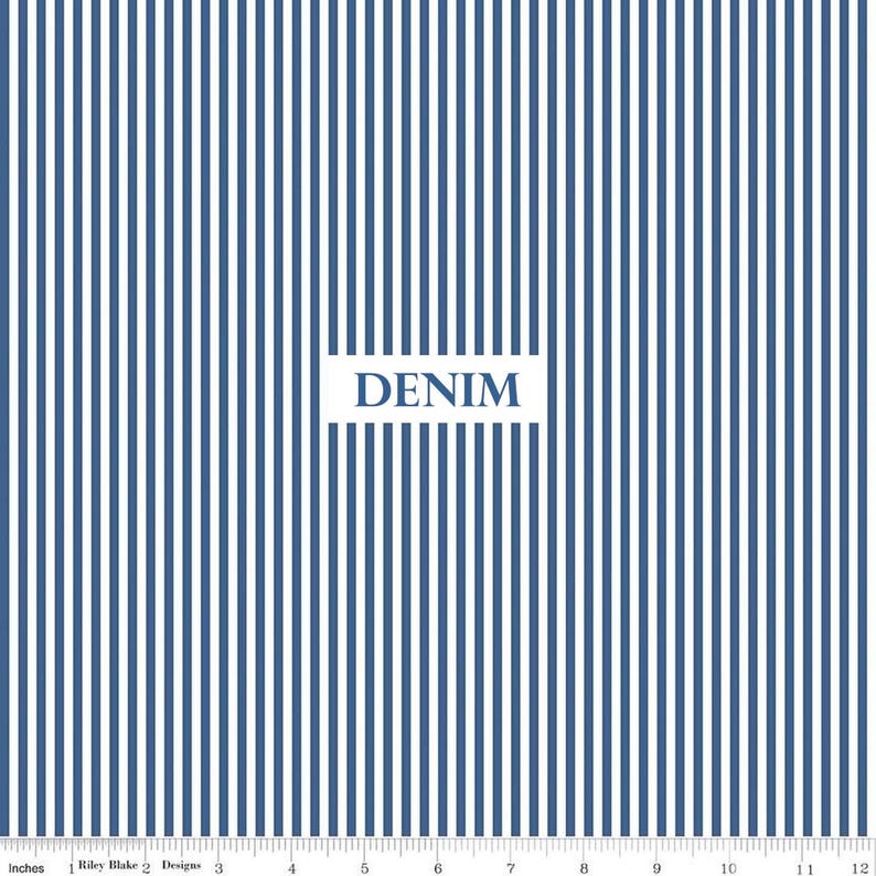 May include: Blue and white striped fabric with the word "DENIM" in a white rectangle. The fabric has vertical stripes and a ruler along the bottom edge, with measurements in inches.