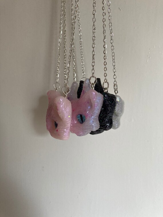 monstercat gold necklace