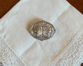 Vintage Sterling Art Deco Brooch with symmetrical leaf and intricate milgrain edges