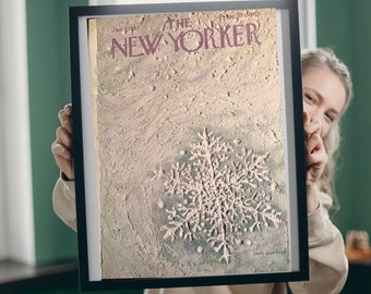 Puede incluir: Una portada de revista vintage enmarcada de The New Yorker de enero de 1967 con un copo de nieve blanco sobre un fondo verde y blanco. El título de la revista "The New Yorker" está impreso en rosa.