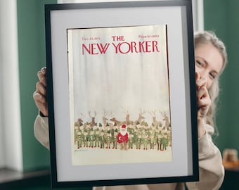 Puede incluir: Una portada de revista vintage de The New Yorker enmarcada del 24 de diciembre de 1973, con una ilustración de acuarela de Santa Claus con renos y duendes. La portada dice "The New Yorker" y "Price 50 cents".