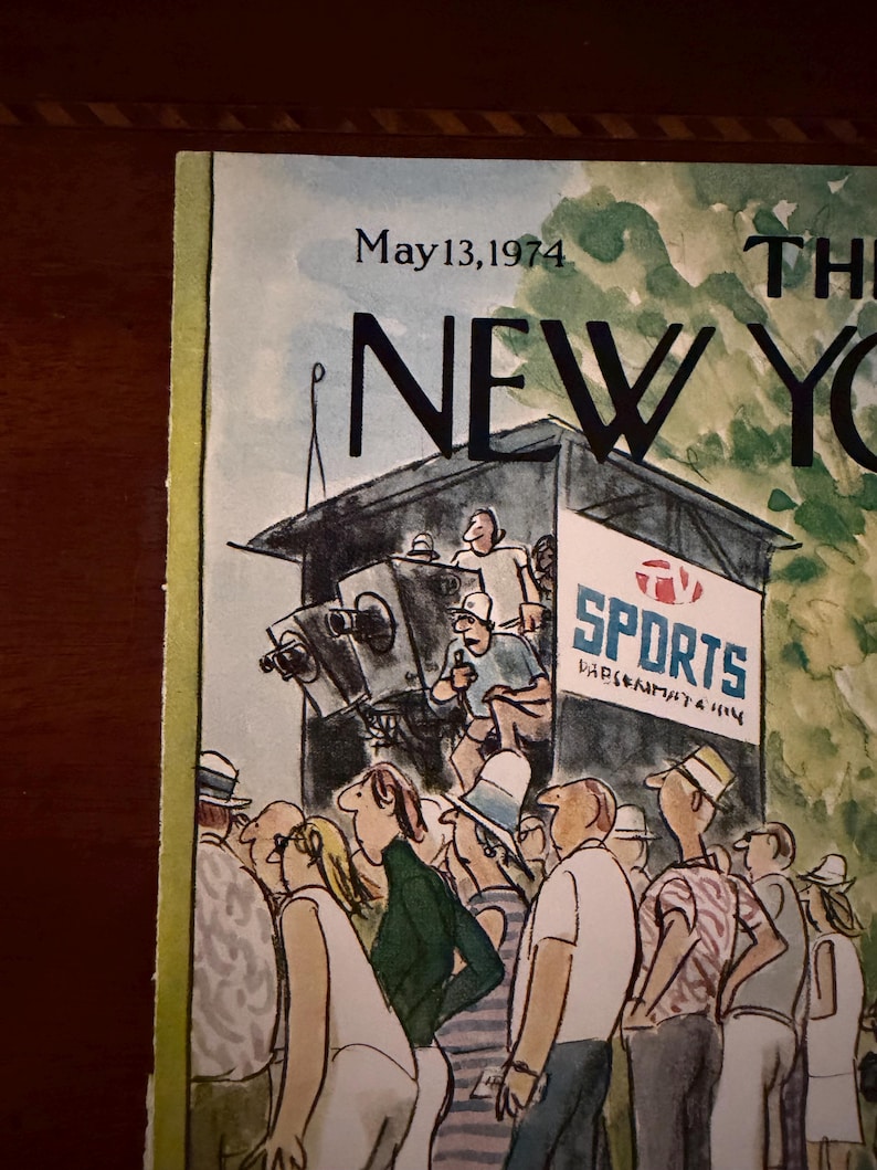 May include: The New Yorker magazine cover from May 13, 1974, featuring an illustration of a crowd watching a sporting event. The artwork depicts a broadcast booth with cameras and the word "SPORTS" on a sign.