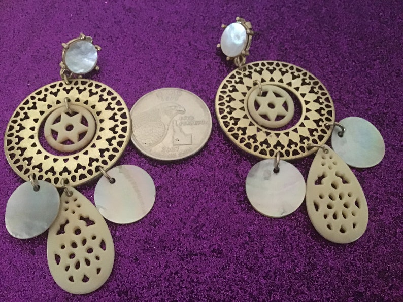 Chandelier earrings by Avon NR