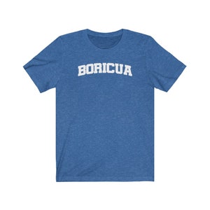 May include: A blue t-shirt with white text that reads "BORICUA" in an arched font.