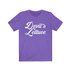 May include: Purple short-sleeved t-shirt with the text "Devil's Lettuce" in white cursive lettering.