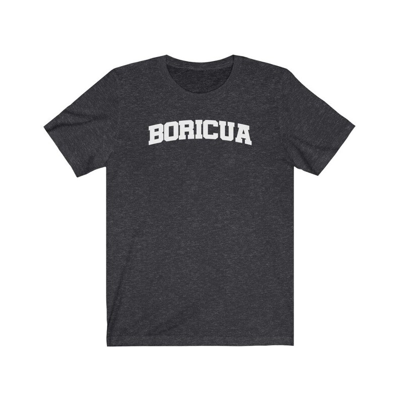 May include: A dark heather grey t-shirt with the word "BORICUA" printed in white on the front.