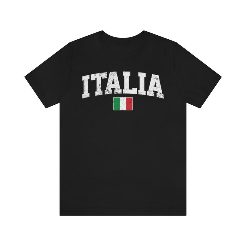 May include: Black t-shirt with a white vintage-style graphic of the word "ITALIA" and the Italian flag.