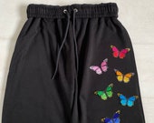 Embroidered butterfly joggers (available in white and black joggers)