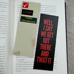 May include: Three bookmarks with different designs. The first bookmark is white with a green rectangle that says "Third Technician" and a black rectangle that says "Lister". The second bookmark is white with a brown stain. The third bookmark is black with white stars and red text that says "Well I Say We Get Out There And Twat It".
