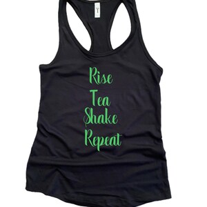 May include: Black tank top with a green graphic that says "Rise Tea Shake Repeat"