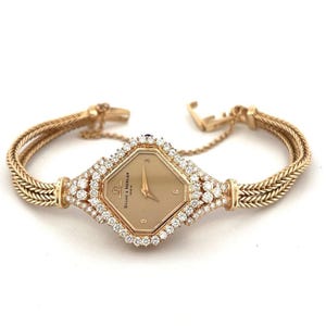 Rare Vintage Baume & Mercier Ladies 14K Yellow Gold 1.50CTW Diamond Quartz Watch