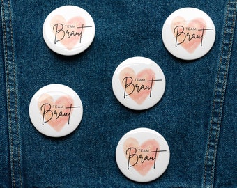 Button-Set Pin Buttons Team Braut JGAShirt Hochzeit Team Braut Herzfarbe pink