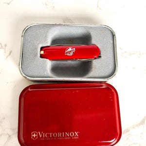 Outil vintage de collection vintage de collection Victorinox Rallye rouge de l'armée suisse