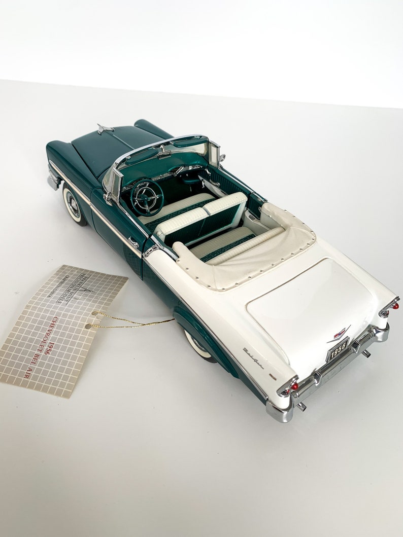 A FRANKLIN MINT scale model of a 1955 Chevrolet Bel-air convertible