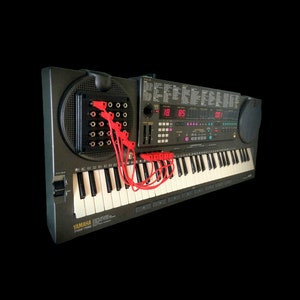 Yamaha PSS 795 Vector AWM Synth + Patch Bay & Random ROM Sequence Generator Switch.