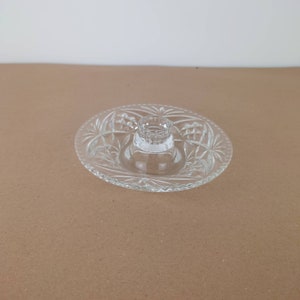 Glass candlestick holder with drip tray