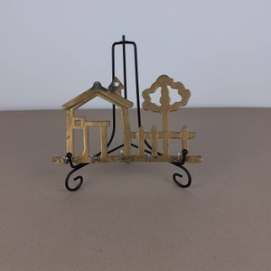Handcrafted clothes hanger. Vintage brass garden/shed style clothes/keys hanger with 5 metal hooks