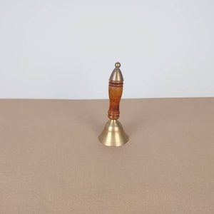 Vintage brass Victorian hand dinner bell
