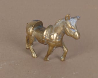 Brass donkey figurine.