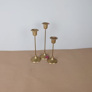 Brass vintage candle holders. 3 brass candlestick holders