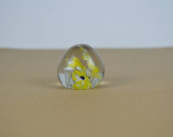 Vintage yellow flower with white petals glass paperweight.