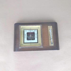 Rare Gischard art deco nautical barometer with temperature gauge. Historic traditional weather station barometer.