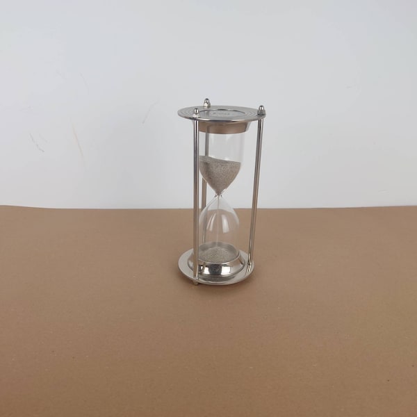 Vintage metal hour glass. Sand watch 1818